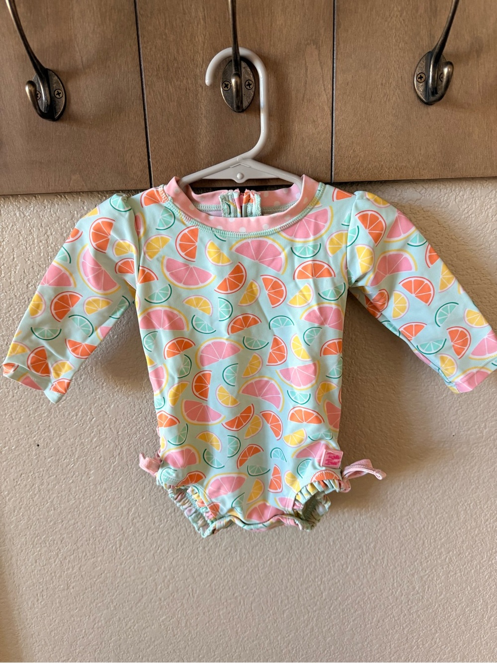 Ruffle Butts Pastel Citrus Long Sleeve Swimsuit - Pink, Mint, Peach